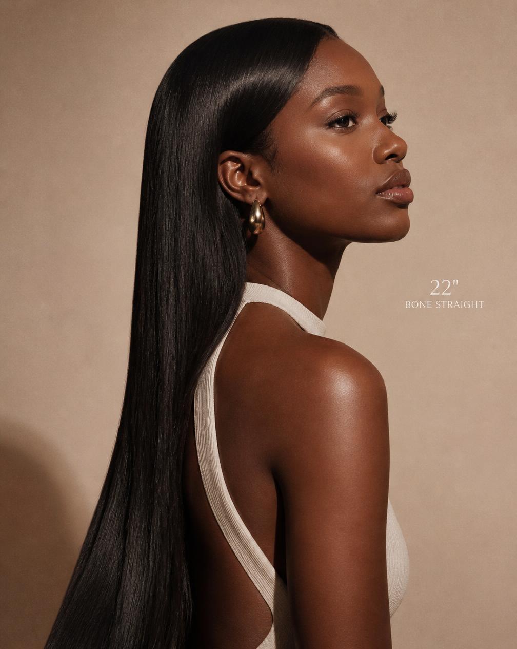 Client in profile wearing long silky straight Mirah hair
